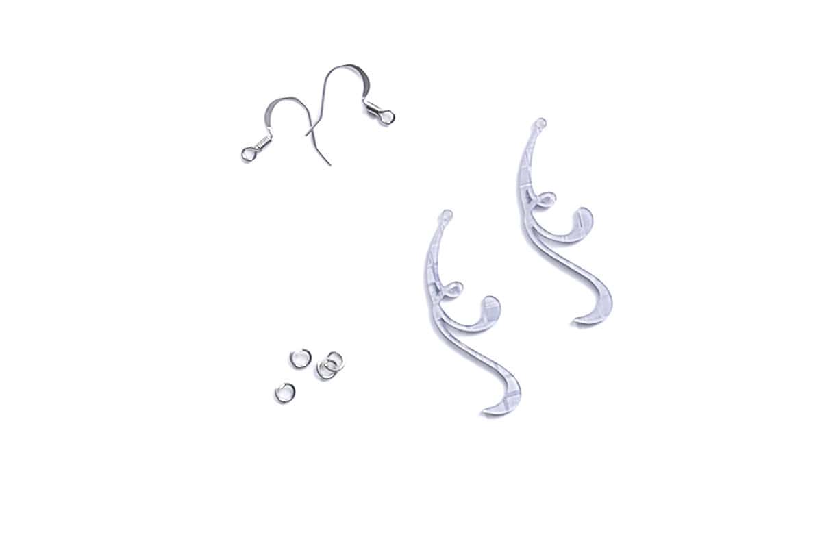 Flourish earrings cut from Gemini Silver Diamonds, two earring hooks and four jump rings.