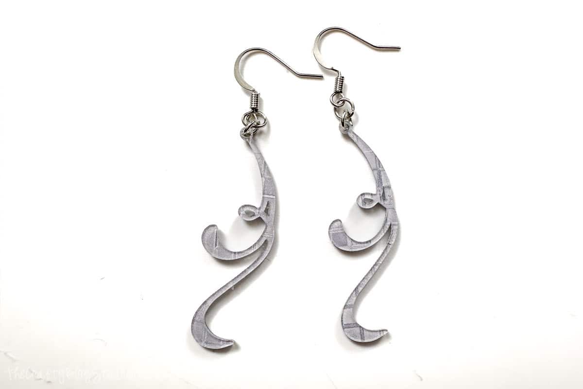 Completed pair of flourish earrings cut from acrylic and a laser cutter.