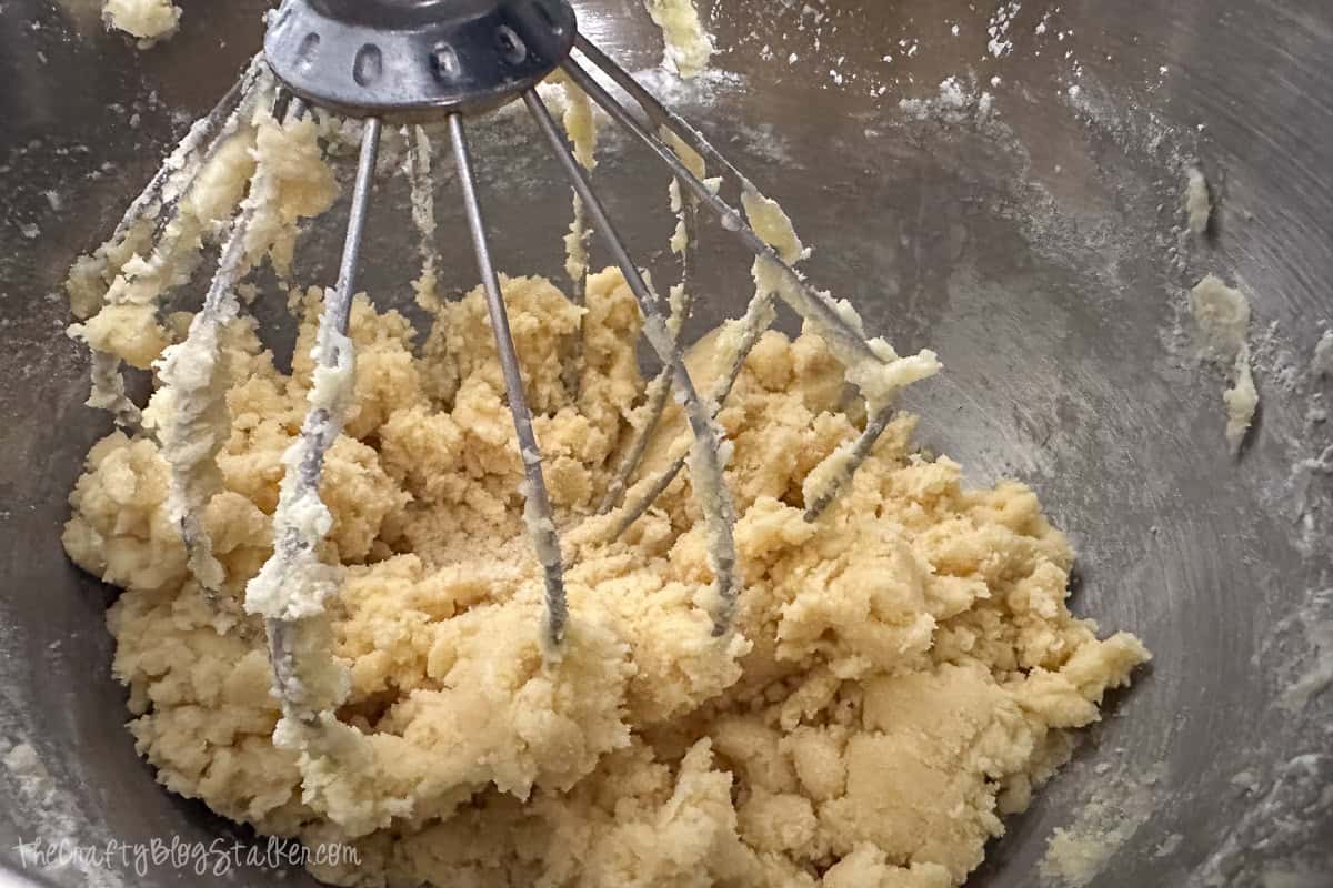 Lemon cookie dough in a mixing bowl.