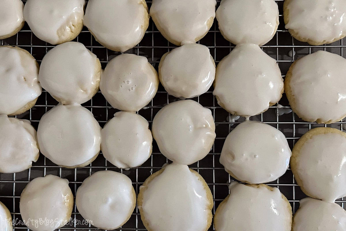 Iced cookies on a cooling rack.