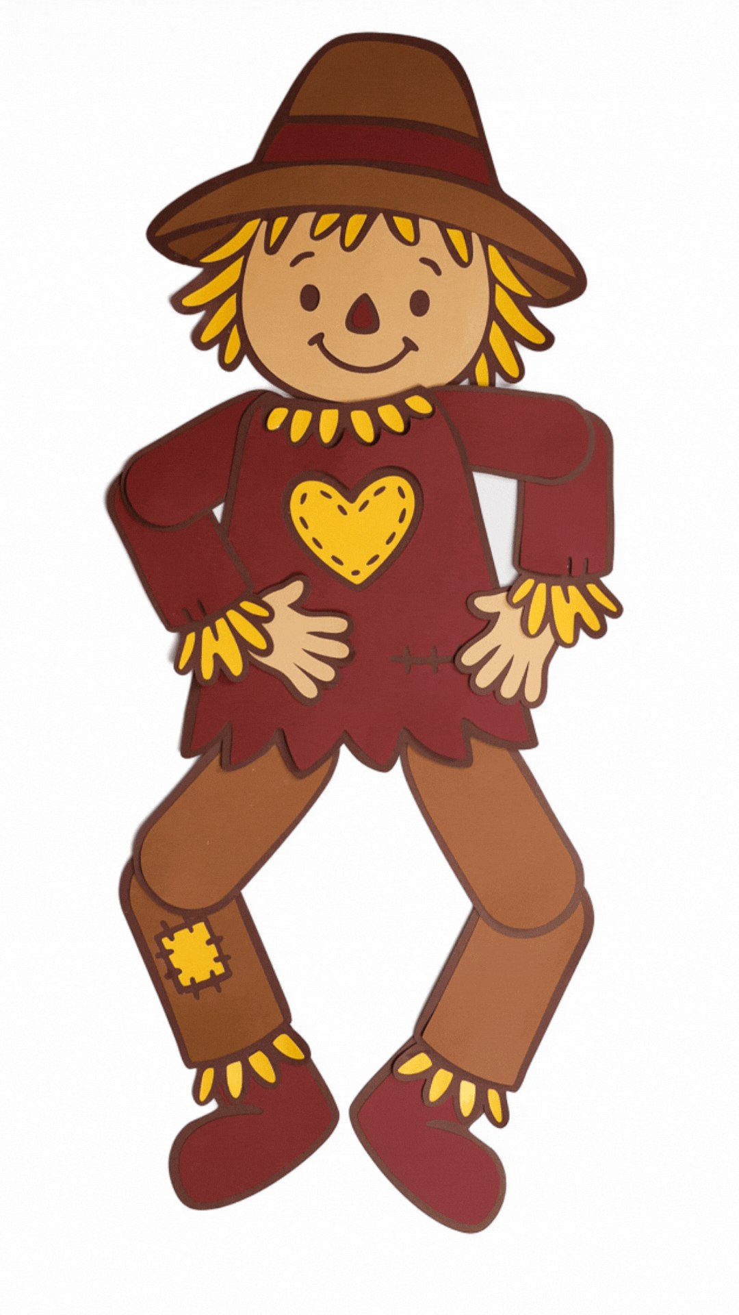 Animated paper scarecrow with a brown hat, red shirt, and yellow heart patch, moving its arms and legs in different playful poses.