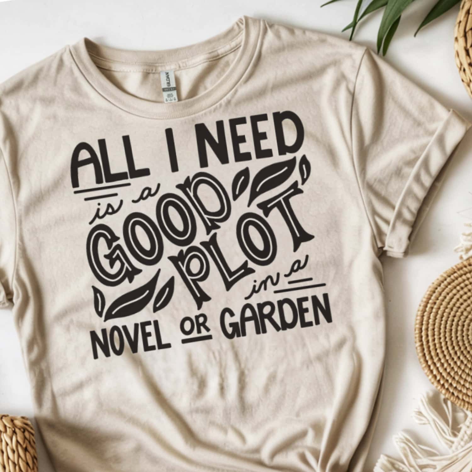 Flat lay of a beige T-shirt with the phrase