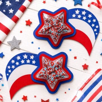Patriotic party favors with star-shaped shaker treats and red, white, and blue paper decorations for a Fourth of July celebration.