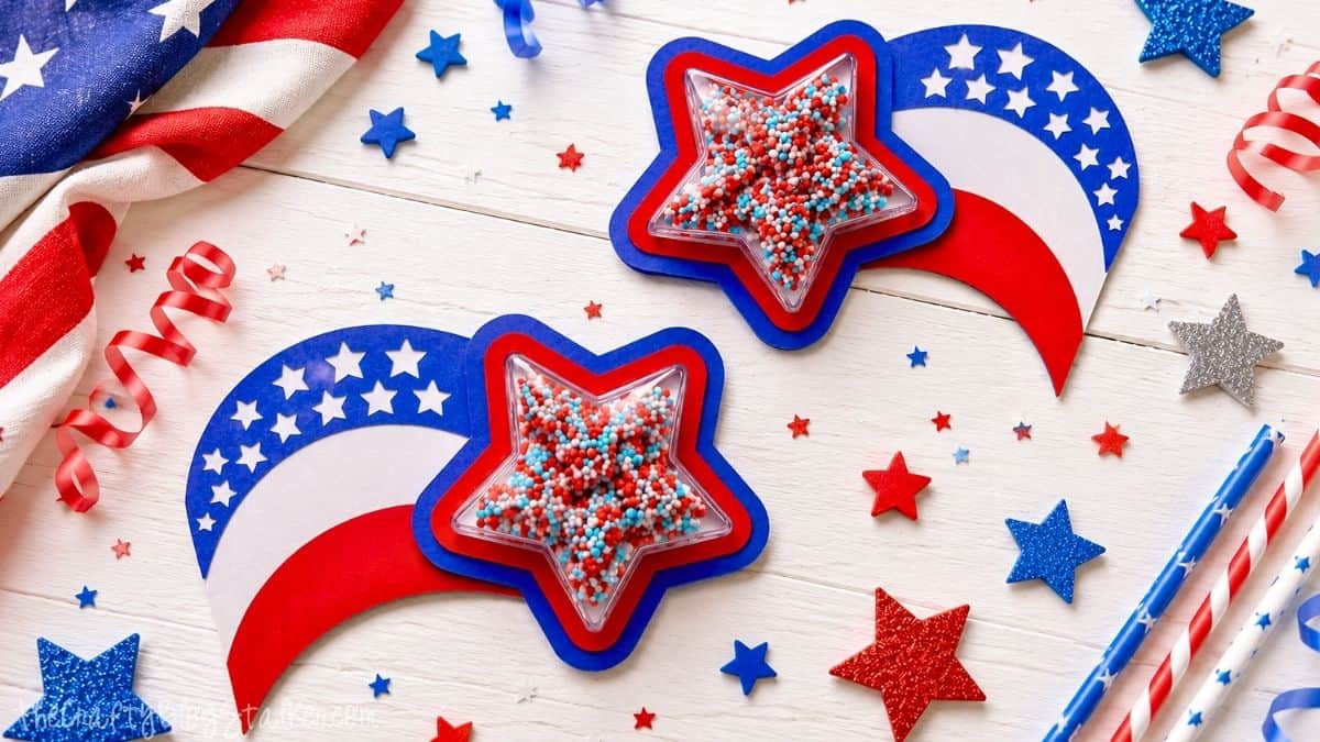 Patriotic party favors with star-shaped shaker treats and red, white, and blue paper decorations for a Fourth of July celebration.