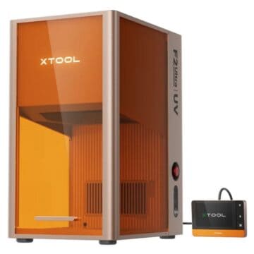 xTool F2 Ultra laser cutter with amber protective enclosure and touchscreen controller displayed on a white background.