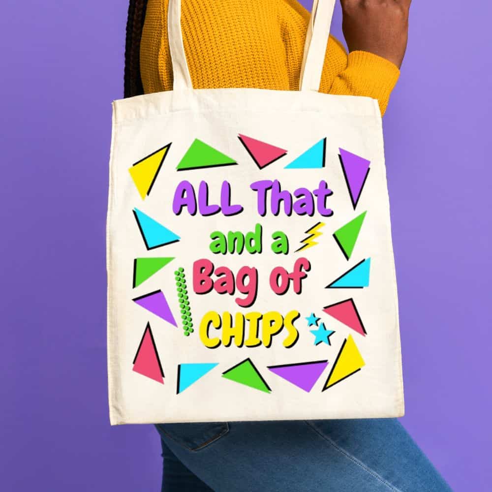 Cream tote bag with a colorful 90s-style All That and a Bag of Chips design featuring bright geometric shapes.