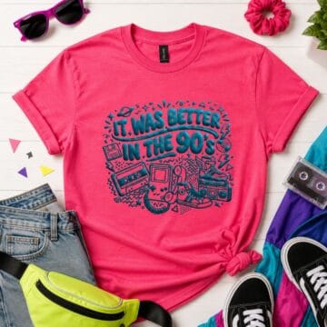 Pink T-shirt with raised blue puff vinyl reading It Was Better in the 90's, surrounded by retro jeans, sneakers, sunglasses, and a cassette tape.