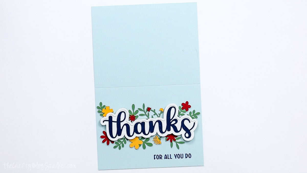 Finished Cricut thank you card with layered blue