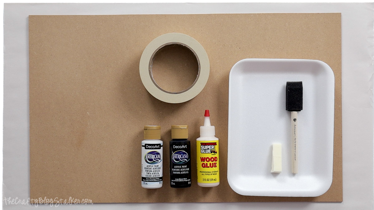 Supplies for a Home Sweet Haunted Home sign, including MDF board, masking tape, acrylic paint, wood glue, foam brush, and chalk.