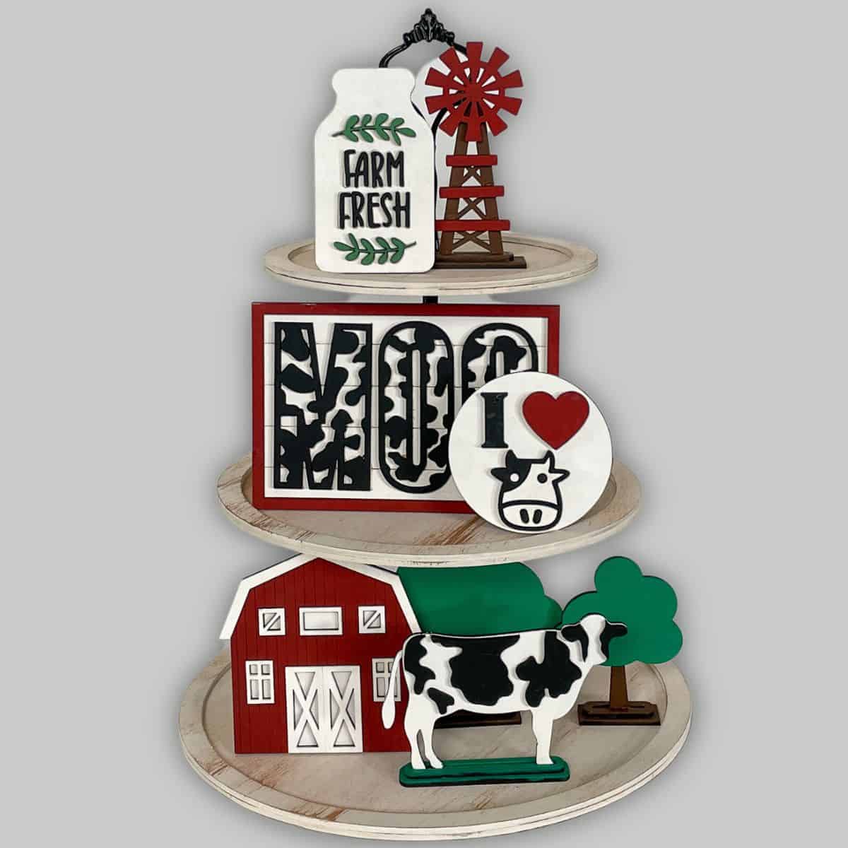 Laser Cut File Bundle: 8 decor pieces that are cow themed - barn, silo, milking can, Moo sign, I heart cows, barn, cow, and two trees.