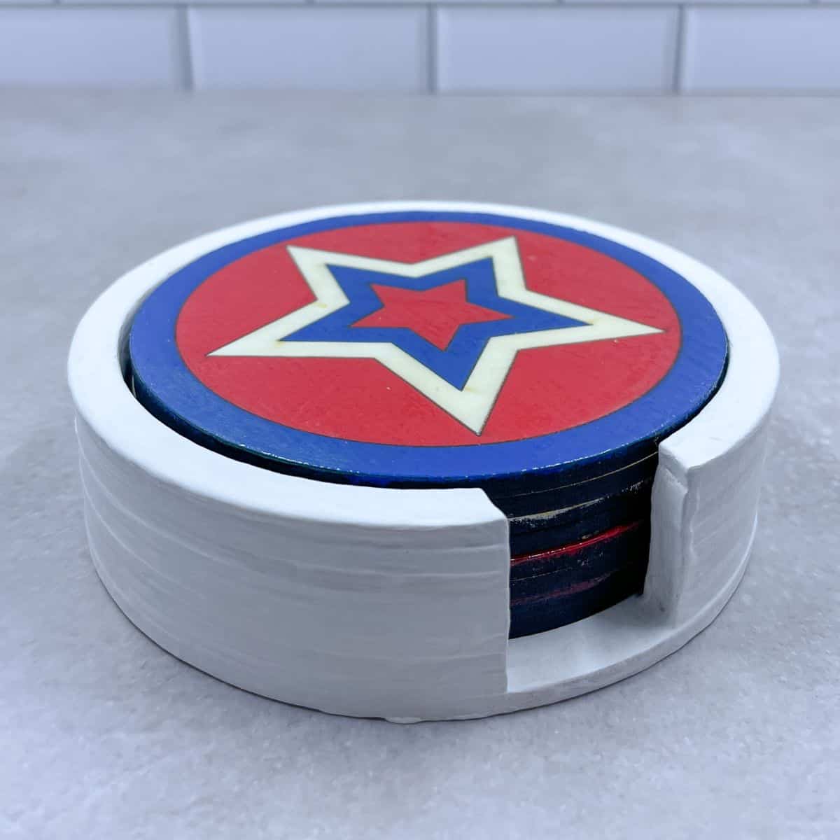 Set of red, white, and blue star laser coasters.