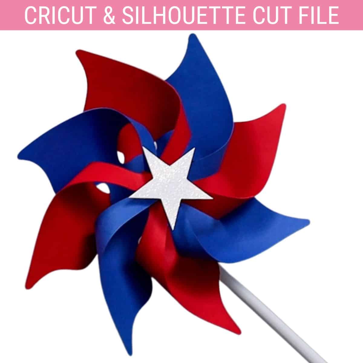 Red and blue paper pinwheel with a white glitter star center, attached to a white stick, made as a patriotic Cricut and Silhouette cut file craft.