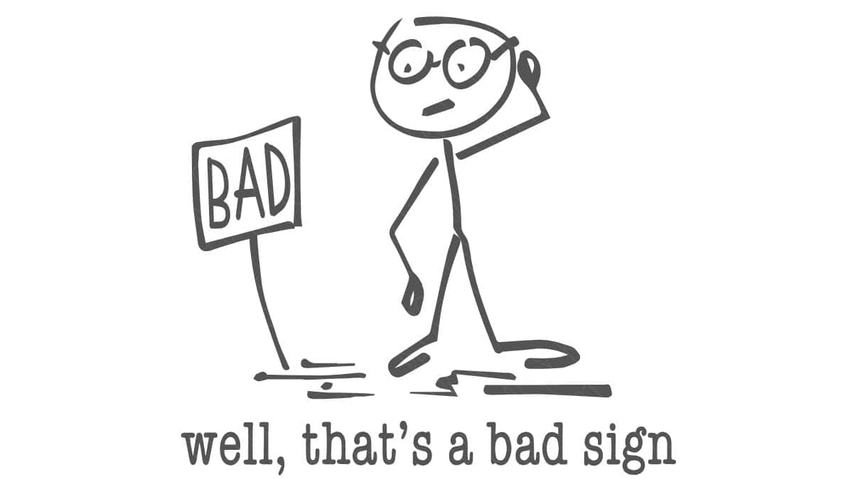 Hand-drawn stick figure standing beside a sign labeled