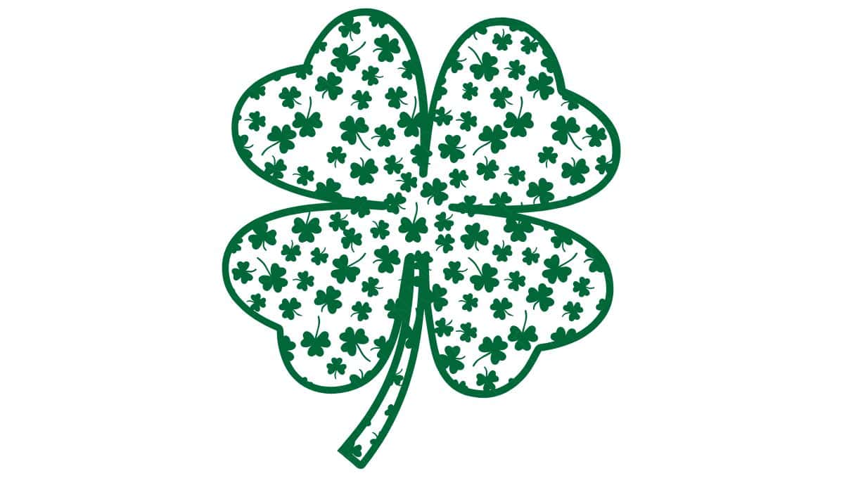 A large green four-leaf clover filled with a repeating pattern of smaller green shamrocks, perfect for St. Patrick’s Day-themed crafts or decorations.