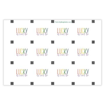 Printable PDF sheet with multiple rainbow-colored “Lucky as can be” designs arranged in a grid, created for cupcake toppers or St. Patrick’s Day crafts.