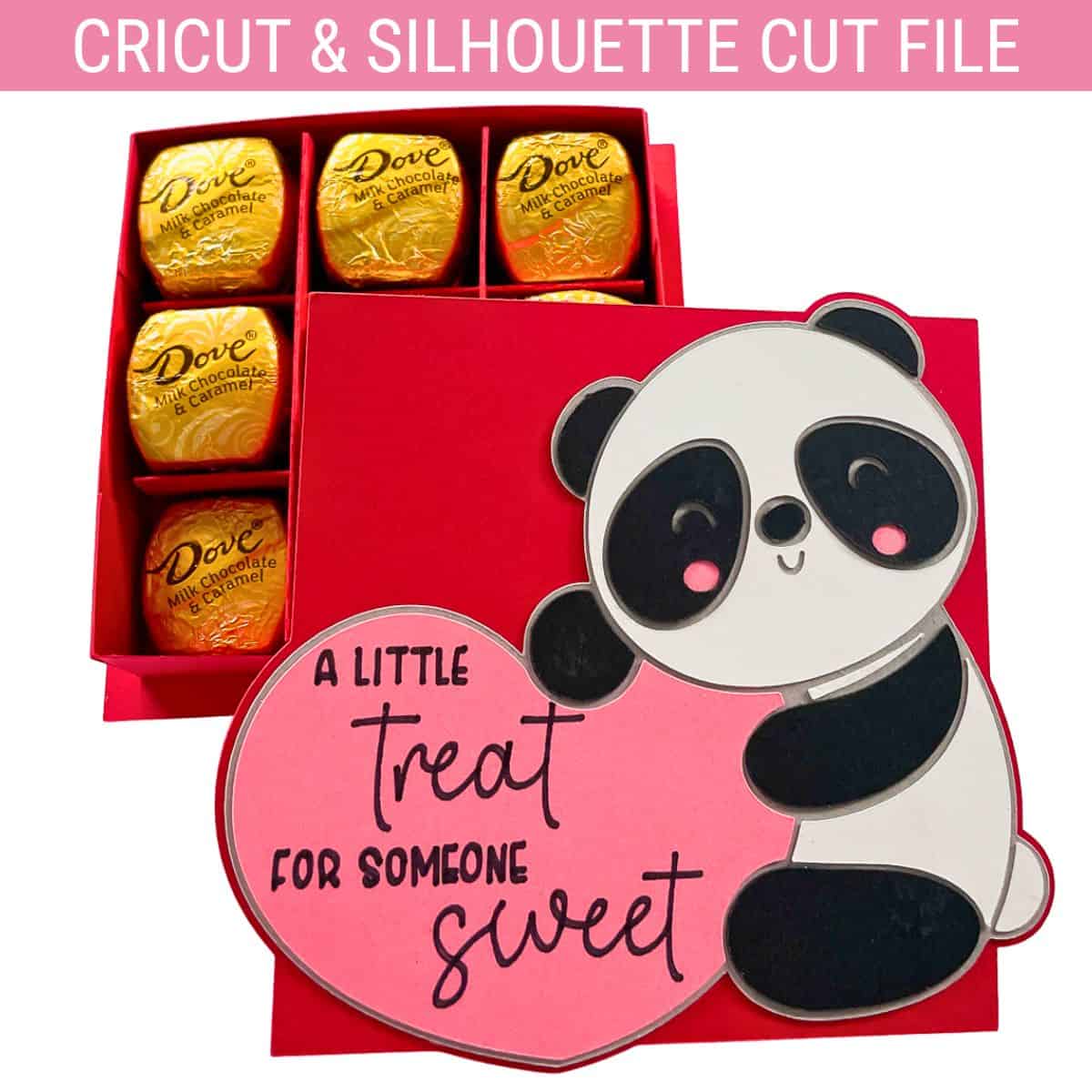 A red gift box filled with Dove chocolates, decorated with a cute panda holding a pink heart that says “A little treat for someone sweet.”