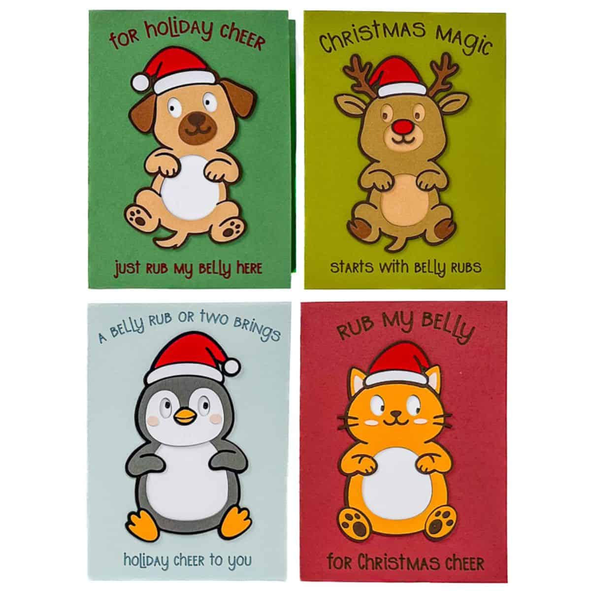 Four handmade Christmas cards featuring cute cartoon animals in Santa hats, each designed with a belly rub theme and playful holiday messages.