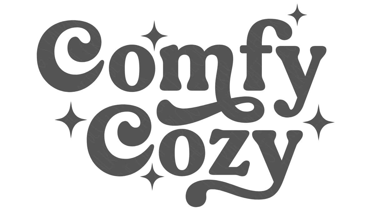 Decorative “Comfy Cozy” phrase design with playful lettering and small sparkle accents, shown as a digital graphic suitable for Cricut or craft projects.