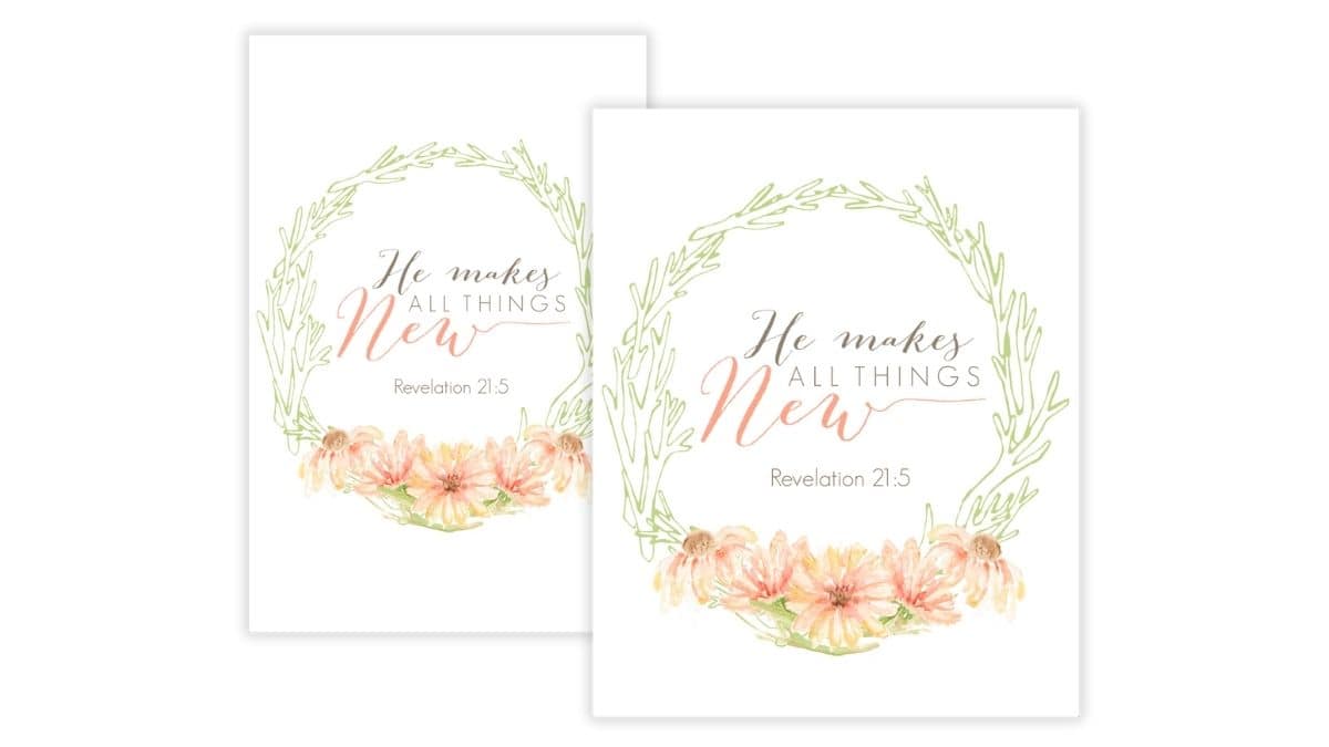 Printable wall art showing a floral wreath design with flowers at the bottom and the Bible verse Revelation 21:5 that reads