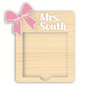 Laser cut wooden note holder frame with a bow accent and the name Mrs. South at the top, designed for holding small notes or photos.