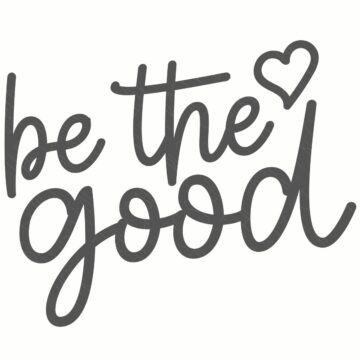 Hand-lettered phrase “be the good” with a small heart accent in a script style on a plain background